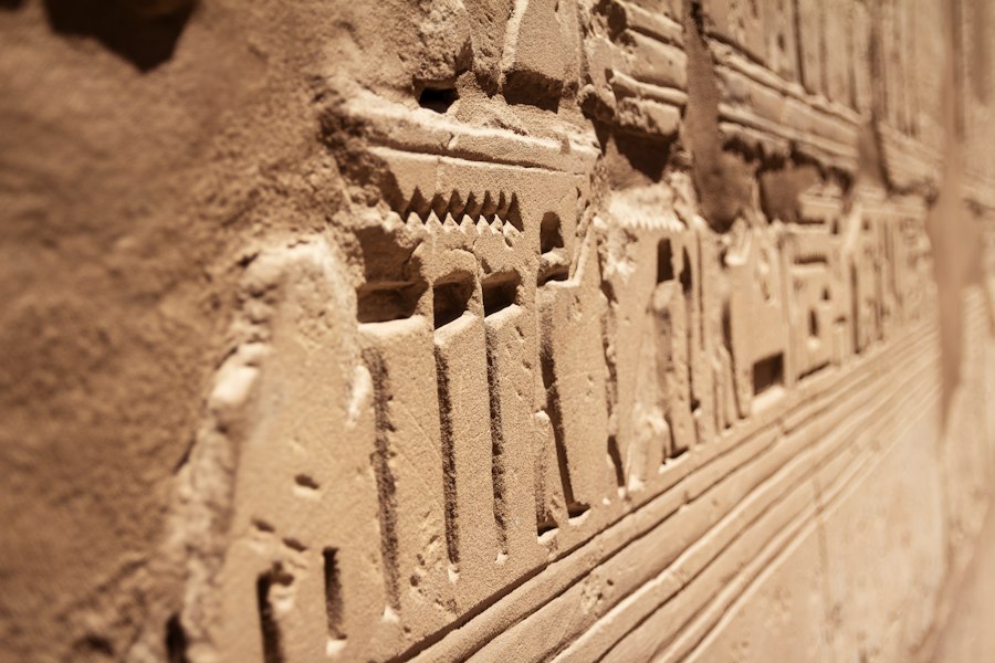 AI archaeology ancient languages decoding